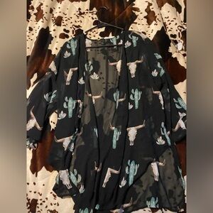 ladies cover up,bought from a boutique and never ended up wearing it :)